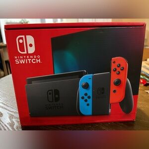 Nintendo Switch with Blue and Red Joy‑Con Controllers